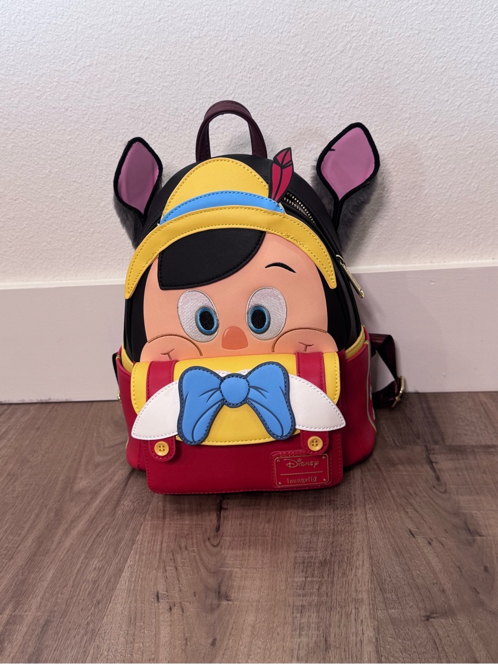 NWT Disney100 Loungefly Pinocchio Donkey Transformation Mini Backpack